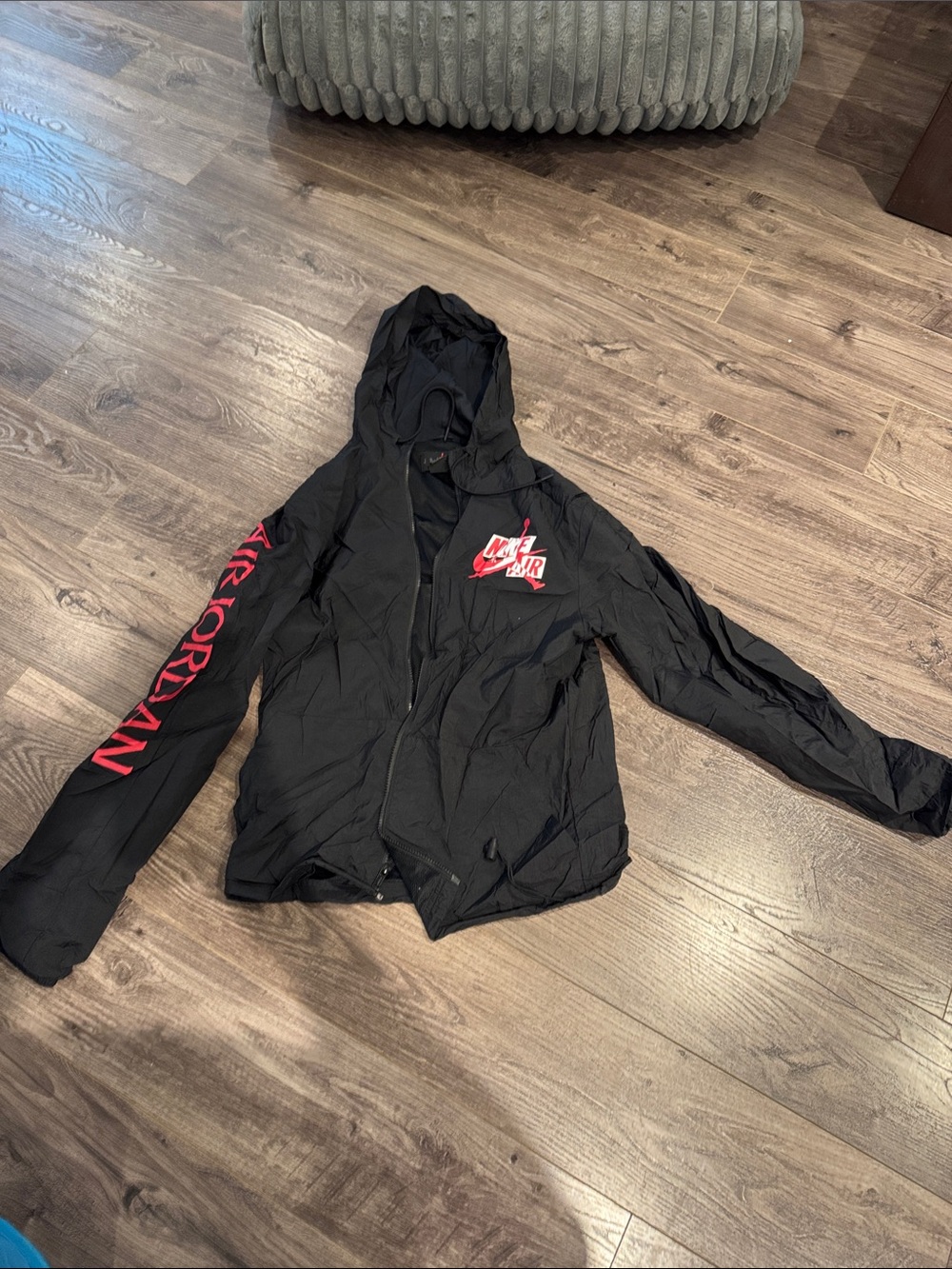 Jordan Black Hooded Windbreaker with Red Logo and Sleeve Text